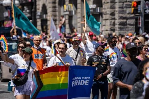 Crowd marching during Pride Parade celebration. Toronto, Canada - June 28, 2026. 库存照片