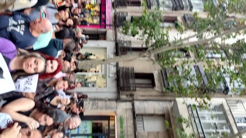 Crowd Marching in Madrid's City Center for Palestine Stock Footage 253179523