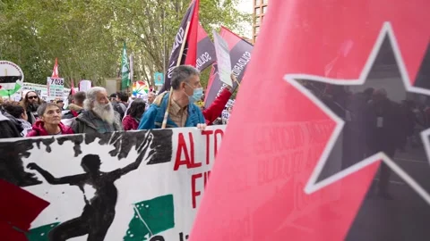 Crowd marching in protest during Pro-Palestine demonstration with banner_6 스톡 동영상 254367680