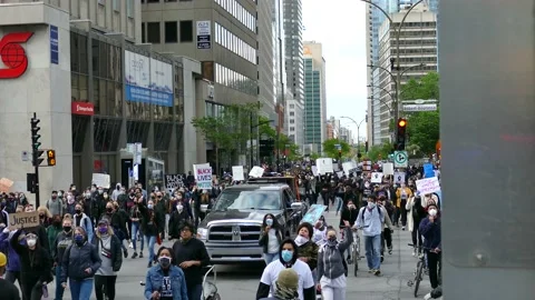 Crowd with mask because of covid-19 walking downtown Stock Footage 132478129