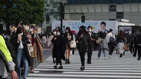 Crowd moving across cross-walk 1 Stock Footage 159841745