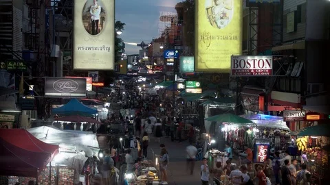 Crowd moving at Khao san road shopping street in Bangkok, Thailand, time lapse. Stock Footage 115671863