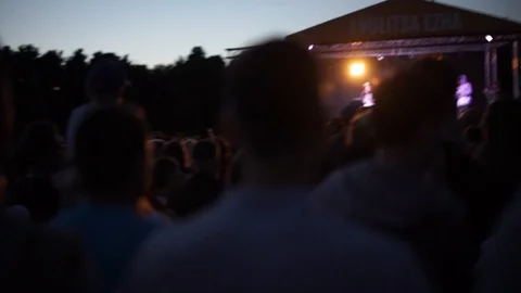 Crowd at open air in the evening summer time Stock Footage 127896620