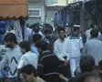 Crowd in outdoor market passage SD Footage