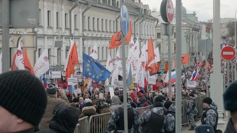 Crowd of participants with flags stopped to shoot Stock Footage 125614562