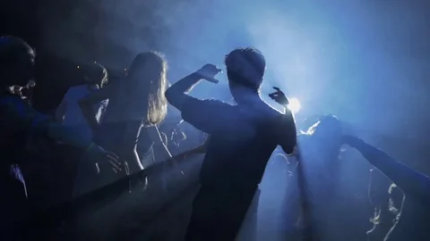 Crowd At The Party. Dances In The Background Of Lights. Slow-mo Stock-Footage 83637796