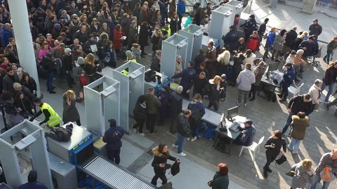 Crowd passing through security check Stock Footage 121371873