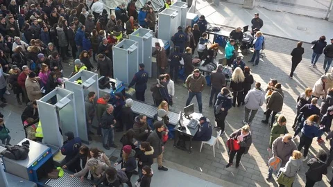 Crowd passing through security check Stock Footage 121371881