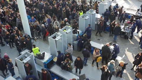 Crowd passing through security check Stock Footage 121371882