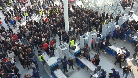 Crowd passing through security check Stock Footage 121371912