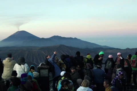 Crowd of people admire Mount Bromo volcano in Java, Indonesia NTSC Stock Footage 41876802