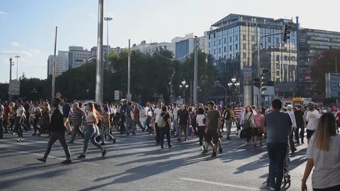 Crowd Of People Are Crossing Road On Crosswalk in city center Stock Footage