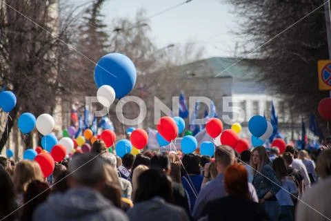 Crowd of people with balloons Stock Photos