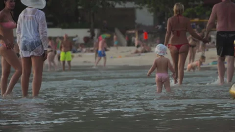 Crowd of people on the beach Stock Footage 237998694