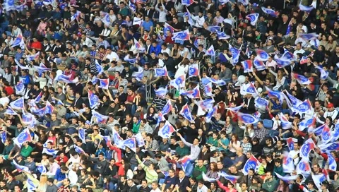 Crowd of people cheers Stock Footage 1089354