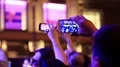 Crowd of people dances at holiday concert HD Footage