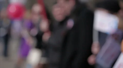 A crowd of people at a demonstration with a light blur Stock Footage 49653308