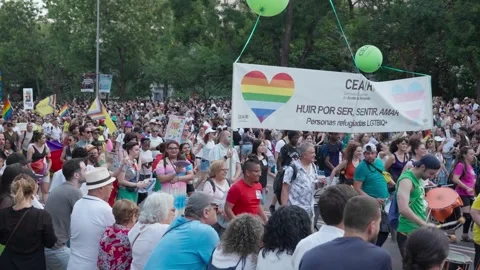 Crowd of people gathered in Paseo de la Castellana during Gay Pride.MOV Stock Footage 279134953