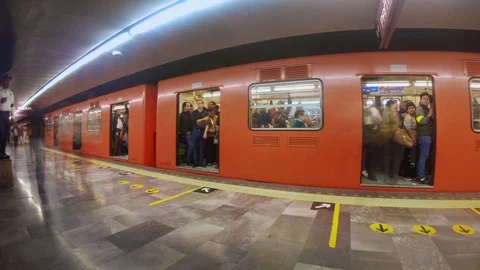 Crowd of People Getting Into Train From Platform in Mexico CDMX timelapse Stock Footage 128333778