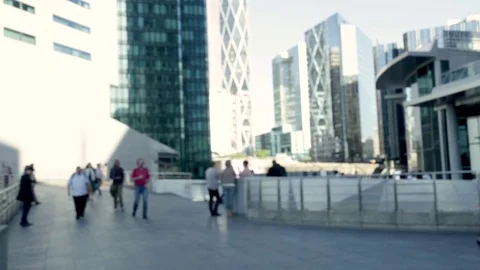 Crowd of people going to work near buildings of a modern business center Stock Footage 76111685