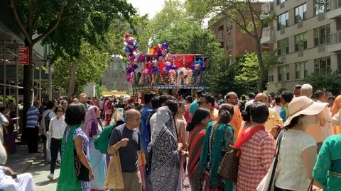 Crowd of people at Hare Krishna parade float in Manhattan New York City NYC Stock Footage 112075563
