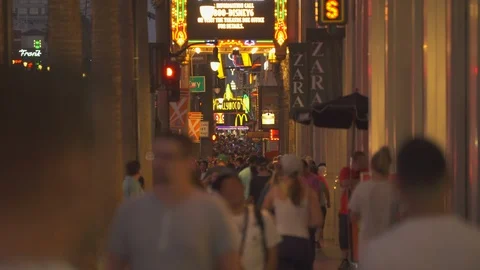 Crowd of people in Hollywood blvd. at night Busy walk of fame street Los Angeles Stock Footage