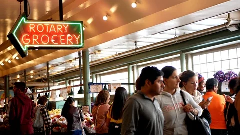 Crowd of people inside the famous fish market in Seattle: Public Market Center Stock-Footage 121410502