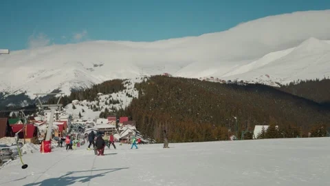 Crowd of people in line by mountain ski resort lift. Stock Footage 296592747