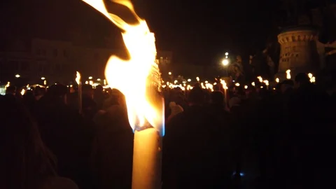 Crowd of people marching with burning torches Stock Footage 125433787