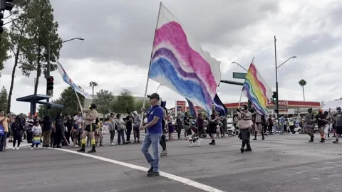 Crowd Of People Marching at Phoenix Pride Parade Arizona LGTBQ Stock Footage 223996725