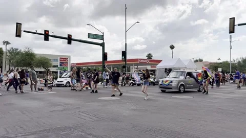Crowd Of People Marching at Phoenix Pride Parade Arizona LGTBQ Stock Footage 223998666