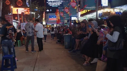 Crowd people in night scene at Jalan Bukit Bintang Stock Footage 106566450