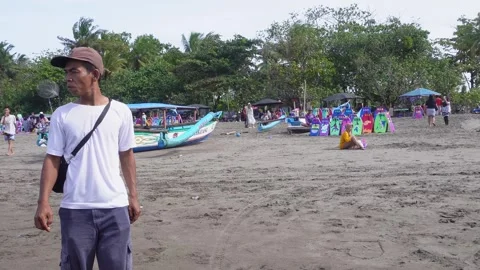 Crowd people at Pangandaran beach Stock Footage 297845489