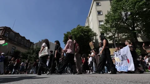 Crowd of people parading during the celebrations of the 25th of April 1974 Stock Footage 334166196