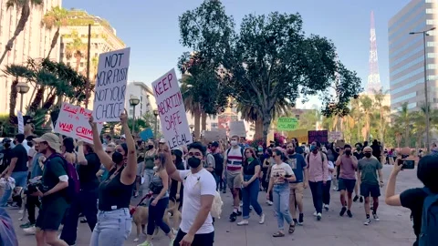 Crowd of people protest the overturning of the Roe v Wade Supreme Court ruling Stock Footage 198472350