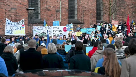 Crowd of people protesting against the Russian invasion of Ukraine Stock Footage 171778916