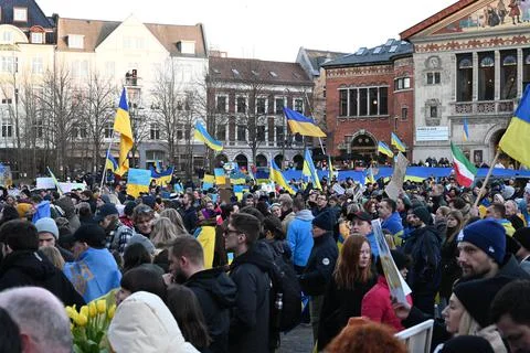 Crowd of people protesting against the Russian invasion of Ukraine: Anti war Stock Photos