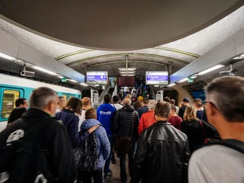 Crowd of people queue Paris metro jam traffic Stock Photos