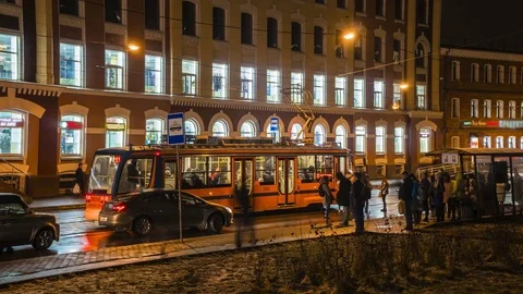 Crowd of people in the queue for the tram at rush hour , time lapse Stock Footage 82588707