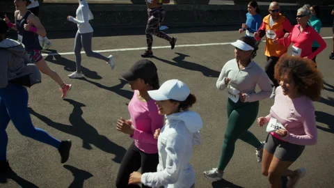 Crowd of people running a marathon Stock Footage 327453701