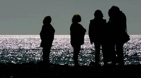 Crowd of people in the sea at sunset Stock Footage 65501038