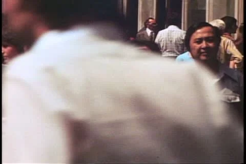 Crowd of people on sidewalk in Piccadilly Circus London, England, 1976. Stock Footage