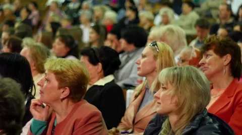 Crowd Of People To Sitting And Listening  In A Large Hall Stock Footage