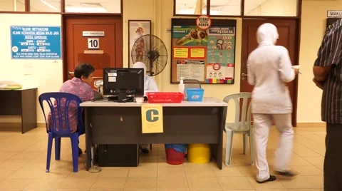Crowd of people sitting and waiting to examine health, sick patient Stock Footage 62579752