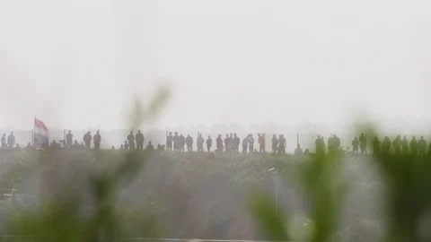 Crowd of people standing on mountain Stock Footage 98628155