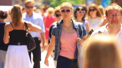 A crowd of people in the summer city. editorial slow motion Stock Footage
