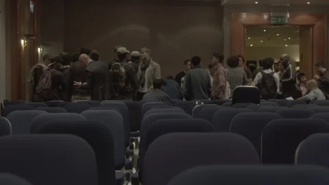 Crowd of people talking and networking in an auditorium Stock Footage 342566417