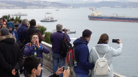 A crowd of people, tourists, on the observation deck. They admire the view of Stock Footage 88104671