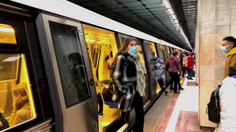 A crowd of people is waiting in front of a train. Stock Footage 280119226