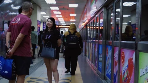  Crowd of people waiting for train at KL Sentral for travelling Stock Footage 105327766